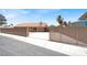This home features a spacious backyard, patio area, and a fully fenced yard for privacy at 1613 Glenrosa Dr, North Las Vegas, NV 89031