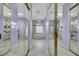 Spacious bathroom with dual vanities, soaking tub, and mirrored walls at 1805 Prichard Ave, Henderson, NV 89052