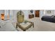 Spacious bedroom with sitting area, large windows, and unique decor at 1805 Prichard Ave, Henderson, NV 89052