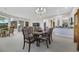 Elegant dining room with a chandelier, comfortable seating and decor with a sophisticated ambiance at 1805 Prichard Ave, Henderson, NV 89052