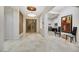 Spacious foyer with tile flooring, decorative lighting, and elegant architectural details at 1805 Prichard Ave, Henderson, NV 89052
