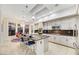 Spacious kitchen with a large island, stainless steel appliances, and adjacent dining area with scenic views at 1805 Prichard Ave, Henderson, NV 89052