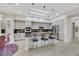 Bright kitchen with granite countertops, stainless appliances, and island with seating at 1805 Prichard Ave, Henderson, NV 89052