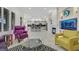Open floorplan shows living room, kitchen, and fireplace with modern fixtures and design elements at 1805 Prichard Ave, Henderson, NV 89052