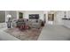 Open living room with large windows, comfortable seating, and stylish decor with a sophisticated ambiance at 1805 Prichard Ave, Henderson, NV 89052