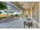 Charming outdoor patio featuring comfortable seating, a pergola, and views of the beautifully landscaped backyard at 1805 Prichard Ave, Henderson, NV 89052