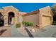 Charming single-story home featuring desert rock landscaping and a two-car garage at 1904 Hot Oak Ridge St, Las Vegas, NV 89134