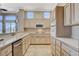 Updated kitchen features stainless steel appliances, ample counter space, and stylish cabinetry at 1904 Hot Oak Ridge St, Las Vegas, NV 89134