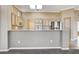 Modern kitchen features stainless steel appliances, a breakfast bar, and ample counter space at 1904 Hot Oak Ridge St, Las Vegas, NV 89134