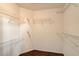 Walk-in closet equipped with wire shelving and hardwood floors at 1904 Hot Oak Ridge St, Las Vegas, NV 89134