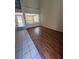 Upstairs living room featuring laminate flooring and natural light at 1941 Golden Trumpet Ave, Las Vegas, NV 89123