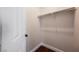 Walk-in closet with hanging racks and hardwood floors at 209 Camino Vista St, Henderson, NV 89012