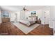 Spacious main bedroom with hardwood floors, neutral walls, and generous closet space, creating a serene retreat at 209 Camino Vista St, Henderson, NV 89012