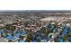 Aerial community view featuring unique blue tile roofs, mature landscaping, and proximity to shopping at 2124 Willowbury Dr # D, Las Vegas, NV 89108