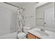 Clean bathroom featuring a tub/shower combo and vanity with a large mirror at 2124 Willowbury Dr # D, Las Vegas, NV 89108