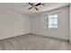 Bright bedroom with ceiling fan and a window providing natural light at 2124 Willowbury Dr # D, Las Vegas, NV 89108