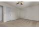 Spacious bedroom with neutral carpet and ample closet space at 2124 Willowbury Dr # D, Las Vegas, NV 89108