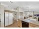 Open kitchen with tile countertops, spacious island, and access to the living area, ideal for entertaining at 2216 Sapphire Valley St, Las Vegas, NV 89128