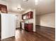 Well-lit kitchen featuring wood floors, matching appliances and dining area at 2606 Durango Dr # 181, Las Vegas, NV 89117