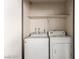 Laundry room featuring a washer and dryer hook up with shelves at 2606 Durango Dr # 181, Las Vegas, NV 89117