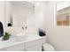 Clean and modern powder room with a vessel sink, floating vanity, and a minimalist design at 3058 Casarano Ct, Henderson, NV 89044
