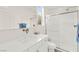 Bright bathroom features a modern vanity, sleek fixtures, and a glass-enclosed shower at 3058 Casarano Ct, Henderson, NV 89044