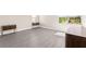 Spacious bedroom features wood-look flooring, bright natural light and minimalist decor at 3058 Casarano Ct, Henderson, NV 89044
