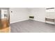 Open concept bedroom features wood-look flooring, bright natural light and minimalist decor at 3058 Casarano Ct, Henderson, NV 89044