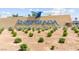 The Inspirada community sign showcases the welcoming atmosphere with beautiful landscaping at 3058 Casarano Ct, Henderson, NV 89044