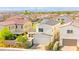 Beautiful two-story home featuring a brick driveway, two car garage, and well-maintained landscaping at 3058 Casarano Ct, Henderson, NV 89044