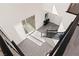 Bright open foyer with a staircase featuring contemporary railings at 3058 Casarano Ct, Henderson, NV 89044
