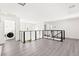 Open loft area with a laundry room, offering a versatile space for relaxation or entertainment at 3058 Casarano Ct, Henderson, NV 89044