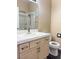 Bathroom with tiled counter and a shower with glass doors at 3679 Funston Way, Las Vegas, NV 89129