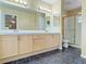 Bathroom features double sinks, shower and vanity at 3679 Funston Way, Las Vegas, NV 89129