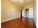 Bright bedroom with wood flooring, ceiling fan and closet at 3679 Funston Way, Las Vegas, NV 89129