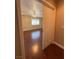 Inviting bedroom showcasing a ceiling fan and wood floors at 3679 Funston Way, Las Vegas, NV 89129