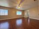 Spacious main bedroom with wood flooring and windows at 3679 Funston Way, Las Vegas, NV 89129