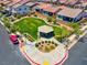 Aerial view of a neighborhood park, showcasing lush greenery and recreational space at 369 Old Erie Pl, Henderson, NV 89011