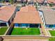 Aerial view of a backyard with artificial grass, enclosed by a block wall fence at 369 Old Erie Pl, Henderson, NV 89011