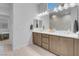 Bright bathroom with double vanity and quartz countertops at 369 Old Erie Pl, Henderson, NV 89011