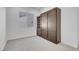 Guest bedroom features a built-in Murphy bed with integrated shelving at 369 Old Erie Pl, Henderson, NV 89011