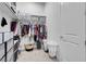 Organized walk-in closet with custom shelving and storage baskets at 369 Old Erie Pl, Henderson, NV 89011