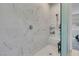 Tiled shower with built-in bench and marble accents at 369 Old Erie Pl, Henderson, NV 89011