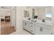 Bathroom showcasing double vanity and modern fixtures at 390 Coastal Redwood St, Las Vegas, NV 89138