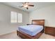 Cozy bedroom with a ceiling fan and carpet floors at 3949 Amanda Bay Ave, North Las Vegas, NV 89081