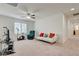 Bonus room with carpet, a ceiling fan, and seating area at 3949 Amanda Bay Ave, North Las Vegas, NV 89081