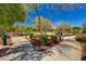 Community park featuring paved walking paths through nicely landscaped areas at 3949 Amanda Bay Ave, North Las Vegas, NV 89081