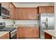 Kitchen with stainless steel appliances and ample cabinet storage at 3949 Amanda Bay Ave, North Las Vegas, NV 89081