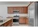 Well-equipped kitchen with stainless steel appliances and granite countertops at 3949 Amanda Bay Ave, North Las Vegas, NV 89081