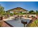 Community picnic area featuring a covered picnic table and grill for outdoor cooking at 3949 Amanda Bay Ave, North Las Vegas, NV 89081